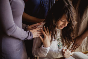 woman praying to move mountains